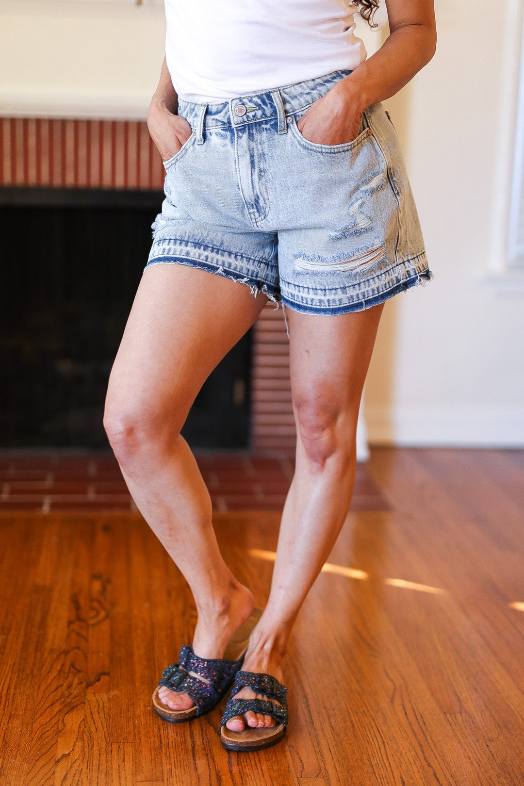 Light Wash High Rise Raw Hem Distressed Denim Shorts