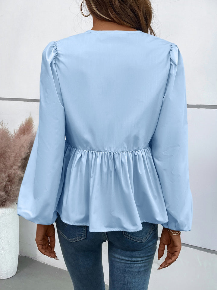 Peplum Tied Long Sleeve Blouse